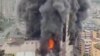 Smoke billows at a shopping centre following fire in the city of Zigong, Sichuan province, China, in this still image obtained from social media video on July 17, 2024. 