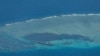 Philippine forces go to disputed shoal without incident, a first since China deal 