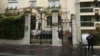 FILE - A police officer guards the Iranian embassy and consulate, April 19, 2024, in Paris. On July 3, 2024, France expelled an Iranian suspected of influence peddling on behalf of Tehran. 