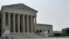 FILE - Security officers stand outside the U.S. Supreme Court building in Washington, DC. (Photo by Diaa Bekheet)