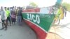 This video grab obtained by AFPTV from TVM on Apr. 8, 2024, shows the boat, that sunk off the north coast of Mozambique killing 96 people, on the Island of Mozambique. (Photo by TVM / AFP) 