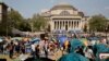 FILE - Student protesters gather inside their encampment on the Columbia University campus, on April 29, 2024, in New York.