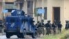 FILE - Pakistani soldiers cordon off a residential building during a raid on a militant hideout in Peshawar, April 16, 2019. Regional authorities announced on Tuesday that four Islamic State-affiliated operatives, reportedly Afghan nationals, were arrested in the city.