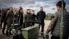 Ukraine's President Volodymyr Zelenskyy inspects newest samples of military equipment and weapons, amid Russia's attack on Ukraine, in Kyiv region, April 13, 2024. (Ukrainian Presidential Press Service/Handout via Reuters)