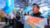 FILE - Amanalla Kashgari of Ashburn Va., with the East Turkistan Youth Congress, protests against China and in support of the Uyghur people, Nov. 28, 2022, outside the State Department in Washington.