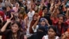 FILE - Students and job seekers shouts slogans as they protest, calling for a ban on quotas for government jobs, at Shahbagh Square in Dhaka, Bangladesh, July 3, 2024.