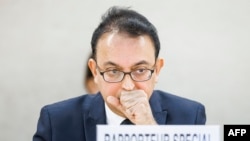 FILE - Javaid Rehman, the U.N.'s independent special rapporteur on the rights situation in Iran, listens to a statement at the United Nations in Geneva on Nov. 24, 2022. 