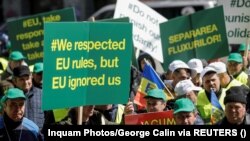 Румунські фермери на протесті у зв’язку з падінням цін на зерно, яке дехто пов’язує з напливом дешевшого збіжжя з України. Бухарест. Румунія 7 квітня 2023 р.