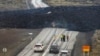 The lava flow that crossed Grindavikurvegur, the road to Grindavik in Iceland, in seen March 17, 2024, a day after the volcanic eruption. 