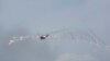 Helikopter Surion tentara Korea Selatan menembakkan suar selama latihan militer bersama Korea Selatan-AS di Seungjin Fire Training Field di Pocheon, Korea Selatan, Kamis, 25 Mei 2023. (Foto: AP)