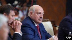 In this photo distributed by the Russian state agency Sputnik, Belarusian President Alexander Lukashenko attends the Shanghai Cooperation Organization member states leaders' summit in Astana, July 4, 2024. He has detained thousands who oppose him. (Sergei Savostyanov/Pool/AFP)