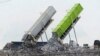 FILE - Garbage is loaded into a landfill in Lenox Township, Mich., July 28, 2022. A new United Nations report estimates that 19% of the food produced around the world went to waste in 2022. 