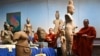 Buddhist monks take part in a repatriation ceremony for Angkorian artifacts returned from the United States at the National Museum in Phnom Penh, Cambodia, July 4, 2024. 