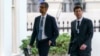 Alphabet CEO Sundar Pichai, left, and OpenAI CEO Sam Altman arrive at the White House for a meeting with Vice President Kamala Harris on artificial intelligence in Washington, May 4, 2023.