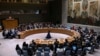 Representatives of member countries take votes during a Security Council meeting at United Nations headquarters, April 18, 2024. 
