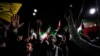 Iranian demonstrators chant slogans during an anti-Israeli gathering in front of the British Embassy in Tehran, Iran, April 14, 2024. 