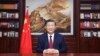 In this photo released on Dec. 31, 2023 by Xinhua News Agency, Chinese President Xi Jinping delivers a New Year message in Beijing to ring in 2024.