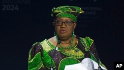 FILE - World Trade Organization Director-General Ngozi Okonjo-Iweala speaks at a WTO summit in Abu Dhabi, United Arab Emirates, Feb. 26, 2024.