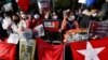 2023年2月1日，居住在日本的缅甸抗议者在缅甸驻东京大使馆外集会纪念缅甸2021年军事政变两周年。（路透社照片）