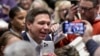 FILE - Florida Gov. Ron DeSantis greets people in the crowd during an event March 10, 2023, in Davenport, Iowa. 