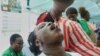 FILE - A nurse administers a dose of the cholera vaccine at the Kuwadzana Polyclinic in Harare, Zimbabwe, Jan. 29, 2024. On Wednesday, the World Health Organization called for action to combat a worldwide spike in cholera cases amid a global vaccine shortage. 