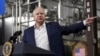 FILE - Gov. Tim Walz, D-Minn., speaks before President Joe Biden at the Earth Rider Brewery, Jan. 25, 2024, in Superior, Wisconsin. U.S. media reports say, Aug. 6, 2024, Vice President Kamala Harris has selected him as her running mate.