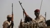 FILE - Sudanese soldiers from the Rapid Support Forces in the East Nile province, Sudan, on June 22, 2019. 