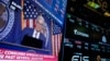FILE - A news conference with Federal Reserve Chair Jerome Powell is seen on a monitor on the floor at the New York Stock Exchange in New York, May 1, 2024.