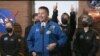 In this still image from a July 6, 2024, NASA TV broadcast, NASA astronaut and deputy director, Flight Operations Kjell Lindgren, center, speaks as crew members, left to right, Kelly Haston, Ross Brockwell, Nathan Jones and Anca Selariu exit the Mars habitat in Houston, Texas.