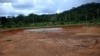 FILE - A partial view of "Las Crucitas Camp" where Canadian Infinito Gold Company's had a project to exploit a gold mine, in Las Crucitas de Cutris, Costa Rica.