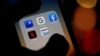 ILUSTRACIJA - Logotipi Gugla, Amazona, Fejsbuka, Epla i Netfliksa na ekranu mobilnog telefona (Foto: Reuters/Regis Duvignau)