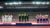 Gold medalist team Jamaica, center, stands with silver medalist United States, left, and bronze medalist Britain during the medal ceremony for the women's 4 x 100-meter relay at the 2020 Summer Olympics, Aug. 7, 2021, in Tokyo.