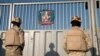 Dominican Republic soldiers keep watch at a gate on the border with Haiti, in Dajabon, Dominican Republic, March 18, 2024.