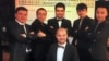 Kasim Kashgar, center front, is photographed with, from right, Semet Ababekri, Abdukadir Rozi, Akber Osman, Mirkamil Ahmed and Mehmut Abdukeyum, during a school party in Urumqi in August 2015. (Photo courtesy of Kasim Kashgar)