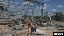 Зруйноване російським бомбардуванням сховище сільгосппродукції в Одеській області, 21 травня 2023 р.