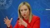 FILE - Italian Prime Minister Giorgia Meloni speaks in Rome. Meloni offered her solidarity with the journalist, Andrea Joly, was beaten up in the northern city of Turin by suspected neo-fascists.