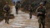 British troops, part of NATO's reinforcements, patrol the Kosovo-Serbia border in Jarinje, Kosovo, Nov. 24, 2023. 