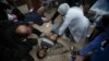 Palestinians wounded in the Israeli bombardment of the Gaza Strip are brought to Al Aqsa hospital in Deir al Balah, Gaza Strip, Jan. 7, 2024.