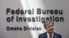FILE - FBI Director Christopher Wray is pictured at the FBI office in Omaha, Nebraska, Aug. 10, 2022. Wray told lawmakers last month that the bureau's data showed searches for U.S. citizens or their information under FISA Section 702 had dropped 93% from 2021 to 2022. 