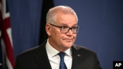 Former Australian Prime Minister Scott Morrison speaks during a news conference in Sydney, Aug. 17, 2022. 