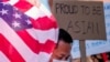 FILE - People take part in a Stop Asian Hate rally at Times Square in New York City, April 4, 2021.