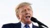 FILE PHOTO: Former U.S. President Donald Trump speaks during a rally to boost Ohio Republican candidates ahead of their May 3 primary election, at the county fairgrounds in Delaware, Ohio, April 23, 2022.