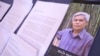 A pamphlet about Sombath Somphone sits on display at an event in Bangkok, Thailand, Dec. 15, 2022, marking the 10-year anniversary of his enforced disappearance in Laos. 