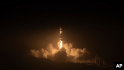 A SpaceX Falcon 9 rocket carrying National Reconnaissance Office mission (NROL-85) launches from Vandenberg Space Force Base, California, April 17, 2022. 