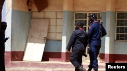 FILE - Police members are deployed after a kidnapping at a school in Kankara, in northwestern Katsina state, Nigeria Dec. 13, 2020. Police launched a rescue operation after gunmen abducted 21 teenagers from a farm in Katsina state on Oct. 30, 2022.