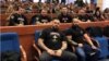 Članovi Udruženja Srbska čast u Narodnoj skupštini RS. Oni negiraju da rade na formiranju paravojnih jedinica, objašnjavajući da su humanitarci.