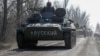 Бронетранспортер з написом «Росіянин» на Донеччині 12 березня 2022 р.