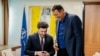 The Prime Minister of Montenegro, Dritan Abazovic, hands Vlade Divac a Montenegrin passport (photo: Vlada Crne Gore)