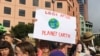 FILE - Protesters demanding action on climate change gather at Te Ngakau Civic Square in Wellington, New Zealand, March 15, 2019. 