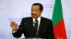 FILE - Cameroon's President Paul Biya takes part in a joint press conference with France's President at The Presidential Palace in Yaounde, Cameroon, on July 26, 2022.